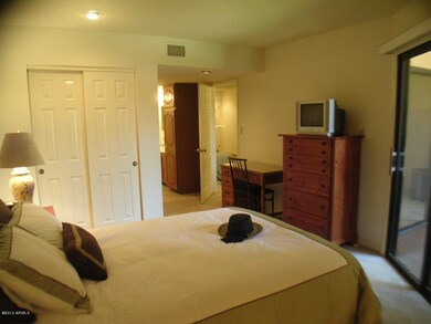 bedroom with door to balcony
