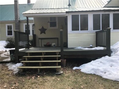 Back Deck and entrance to 3 season...