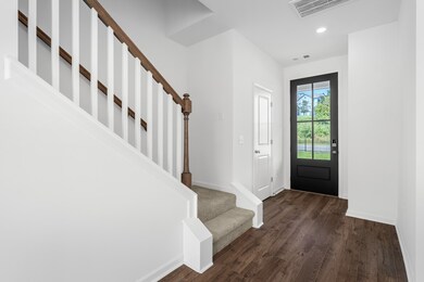 Stirs tucked back for open entry feel