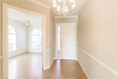 French doors lead to den/home office.