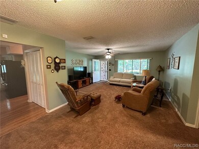 Living room, kitchen to the left