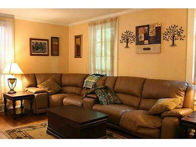 Living Room. Spacious living room with hardwood fl