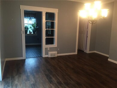 View of the dining room looking toward the kitchen.