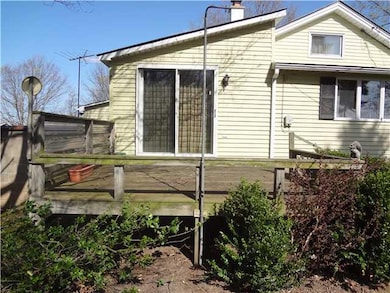 Exterior Back Left side deck with sliding door to 