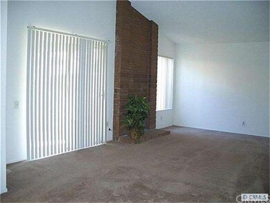 Spacious living room with cathedral ceilings, cozy