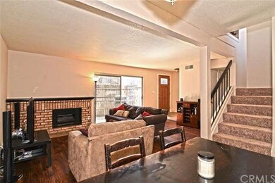 VIEW OF LIVING ROOM FROM THE DINING AREA.