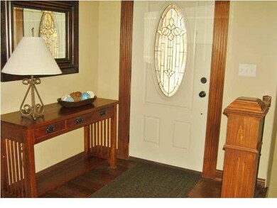 Welcome to your new home with Dark Wood flooring t