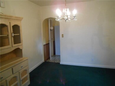 The dining room also features full plaster walls a