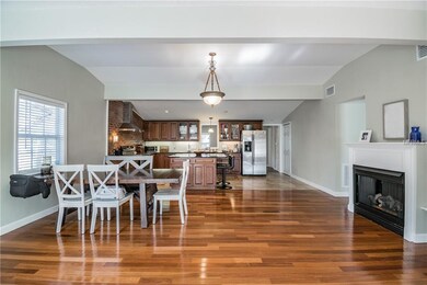 Bright, open floor plan from front entry through k