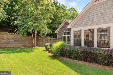 View of the side yard ? very lush with lots of privacy. HOA maintains the green space.