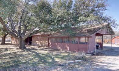 Carport on North side.
