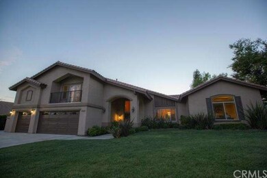 Front of home with beautiful landscaping and huge 
