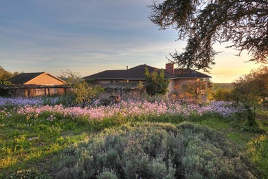A VINTAGE RANCH HOUSE AND GARAGE