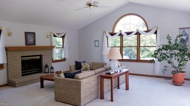 Surrounded by walls of windows and patio doors, th