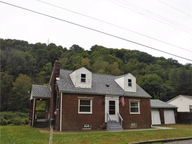 Cute covered side porch and view of back yard 2 st