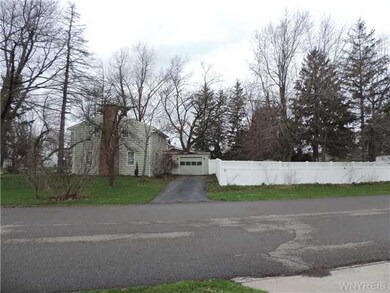 Yard/Garden. Side view showing garage area & the f