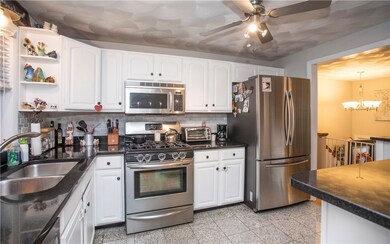 Kitchen with granite counters and stainless steel