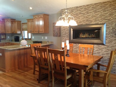 Dining, Fireplace & Kitchen