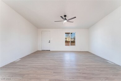 Unfurnished room with visible vents, baseboards, l