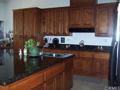 Beautiful Kitchen Island with sparkling granite to