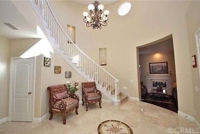 Foyer opens to the formal living room and family r