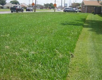 Land/Lot. Side view of deep corner lot!