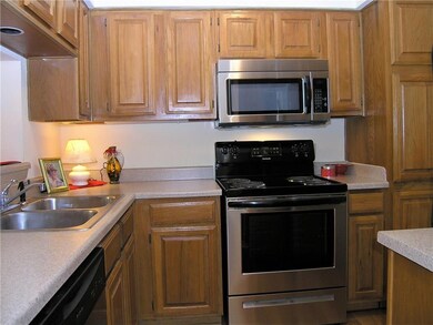 KITCHEN WITH NEW STAINLESS APPLIANCES--DISHWASHER,