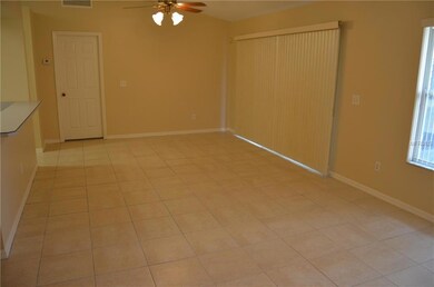 Sliding glass doors to the right lead to patio.  Master bedroom door is straight ahead.