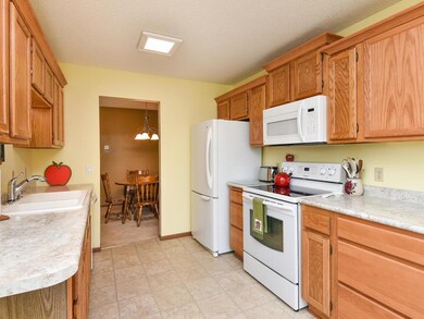 Kitchen viewed back toward Dining room