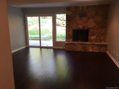 Den with fireplace, smooth ceilings ,recessed  lig