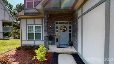 Warm and Welcoming Front Entry with Stone Accents