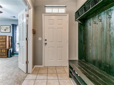 Open entry with room for storage. 1st bedroom is r