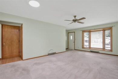 Pella bay windows with blinds inside.