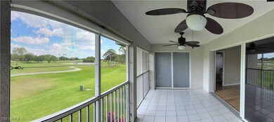 Unfurnished sunroom with a ceiling fan, golf cours