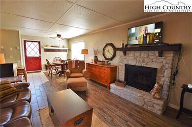 Stone, gas fireplace (wooden box and Indian head d