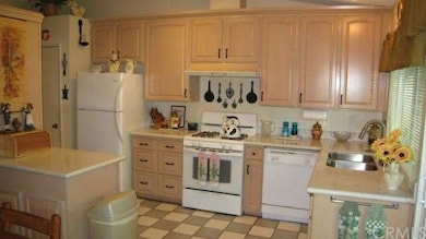 Kitchen has fabulous amount of counter and storage