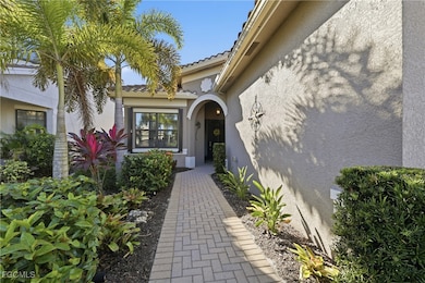Entrance to property featuring stucco siding