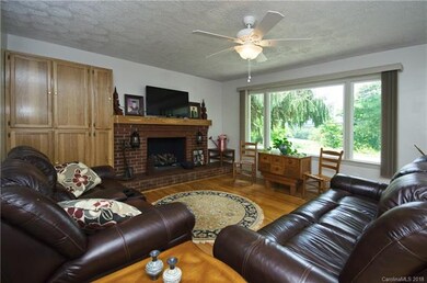Bright living room with built-ins.