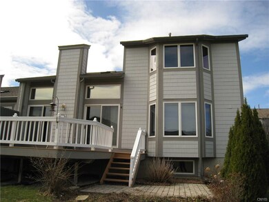 Exterior rear showing deck and patio.