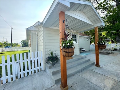 Entry by Garage/Driveway