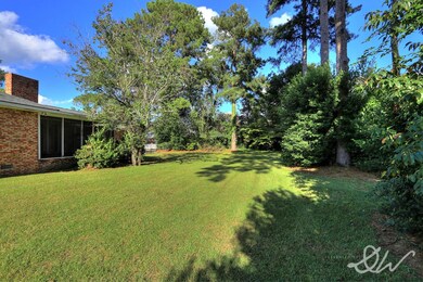 fenced yard and screen porch