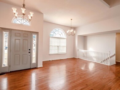 Large entry area with formal dining area