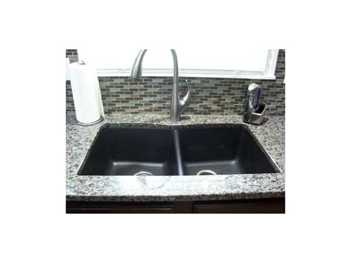 Composite, double bowl kitchen sink.