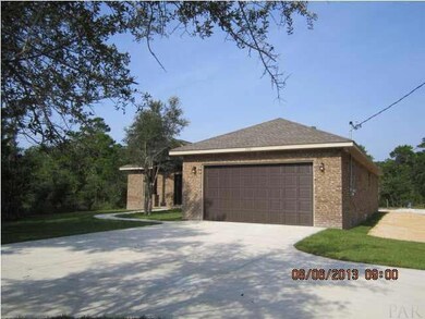 Close up view of home - turn around area to right of driveway