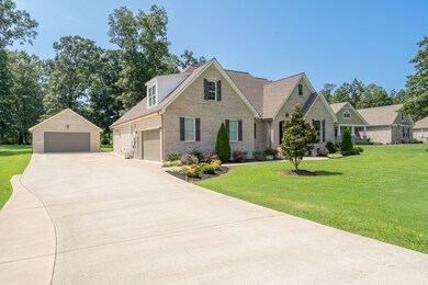 The 4 car garage boasts both an attached and a detached space, offering plenty of room to store vehicles, tools, and more. This configuration provides versatility and functionality for any homeowner's needs.