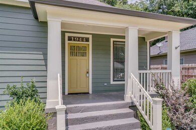 Notice the restored antique door with original doo