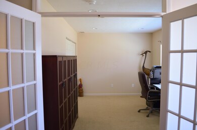 French doors into 1st floor BR (of offic