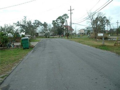 Photo. Looking west down the street