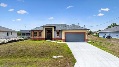 Prairie-style house featuring a front lawn, roof w