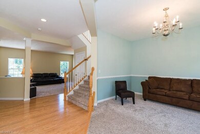 Foyer opening to living room and great room